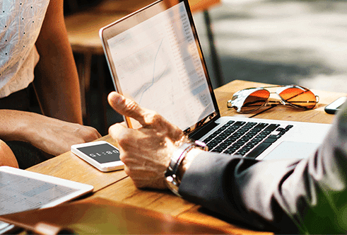 Coworkers looking at a report