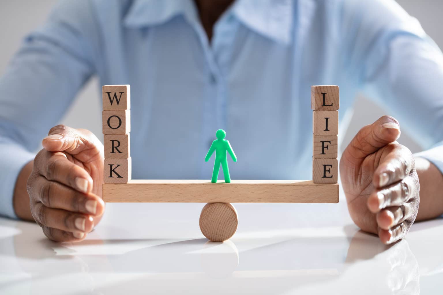 Businesswoman Protecting Work And Life Balance